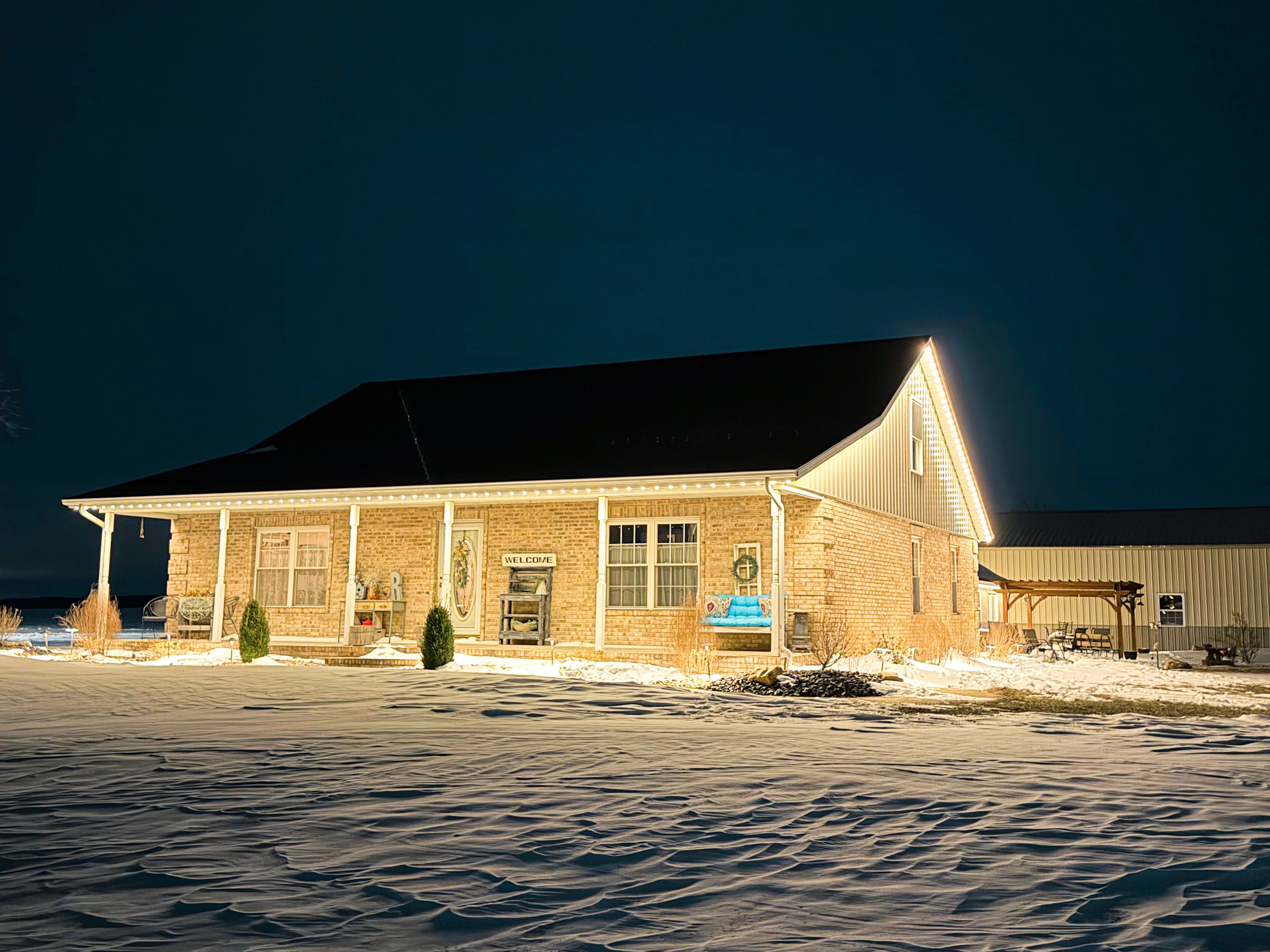 Permanent residential LED roofline lighting on a Kansas City home